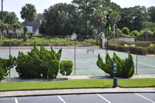 a house view with a garden space and street view