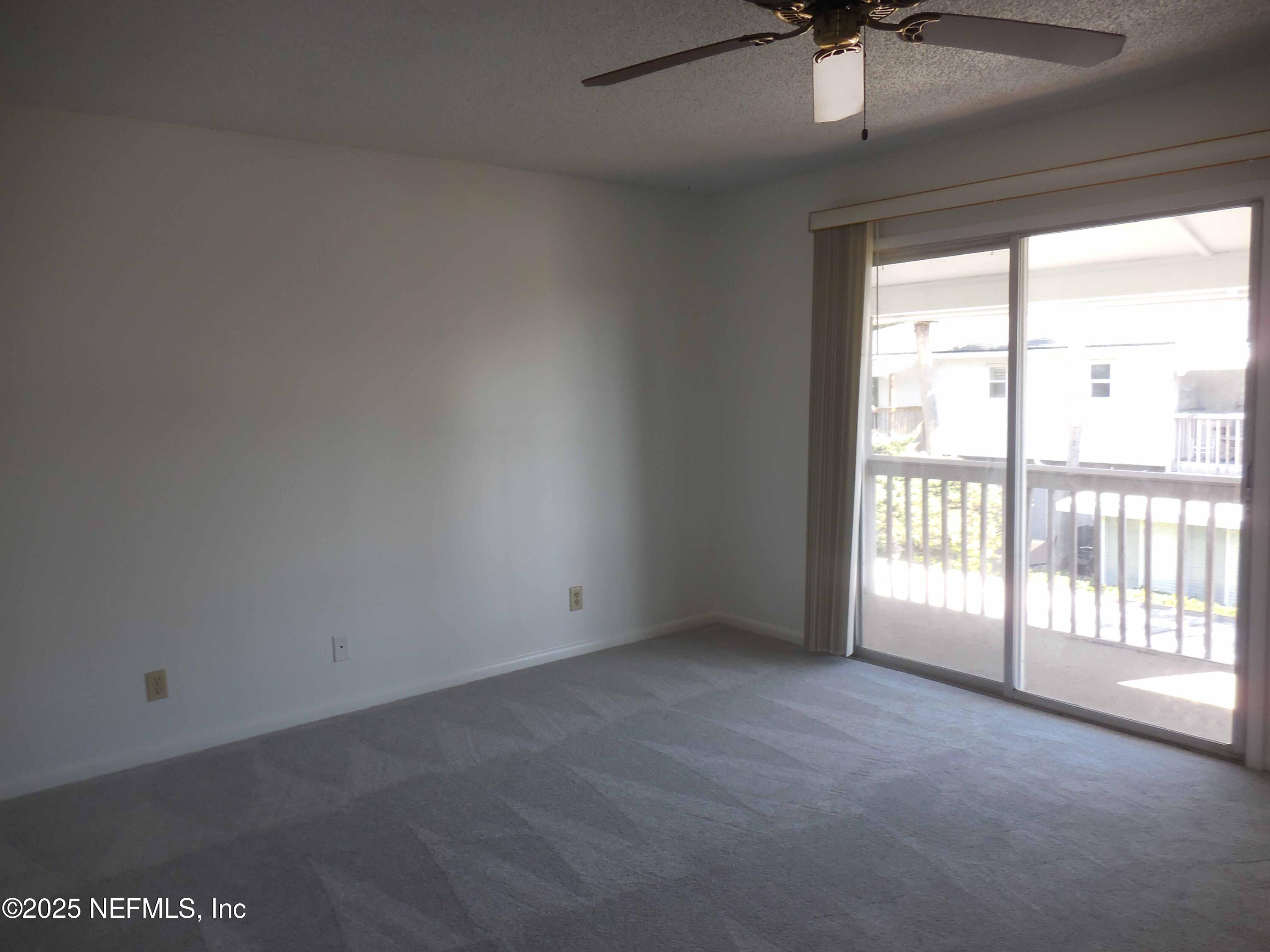 695 A1A North, Unit 23 Ponte Vedra Beach, FL 32082 - Photo 7 of 22 a view of an empty room with a window