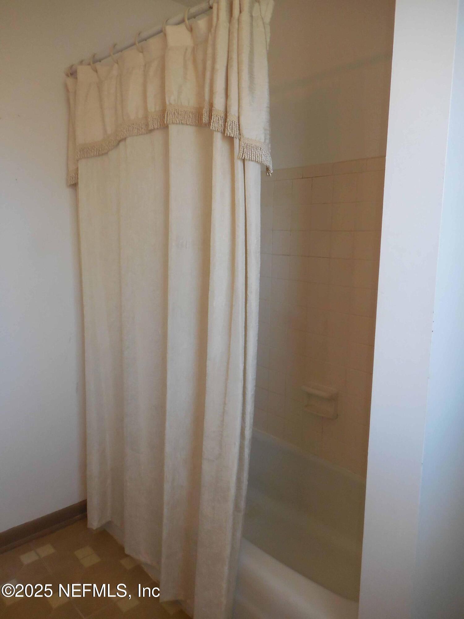 695 A1A North, Unit 23 Ponte Vedra Beach, FL 32082 - Photo 10 of 22 a bathroom with a shower