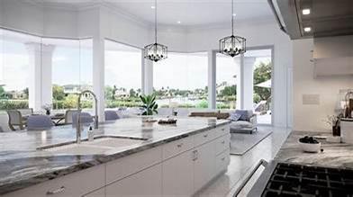 10150 Pleasant Grove School Road Elk Grove, CA 95624 - Photo 9 of 12 a kitchen with sink refrigerator and large window