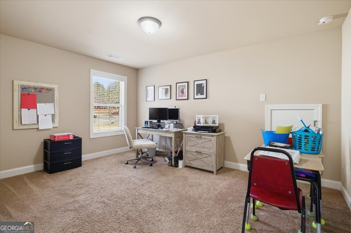 440 Creekside Park Covington, GA 30014 - Photo 30 of 57 a workspace with furniture and window