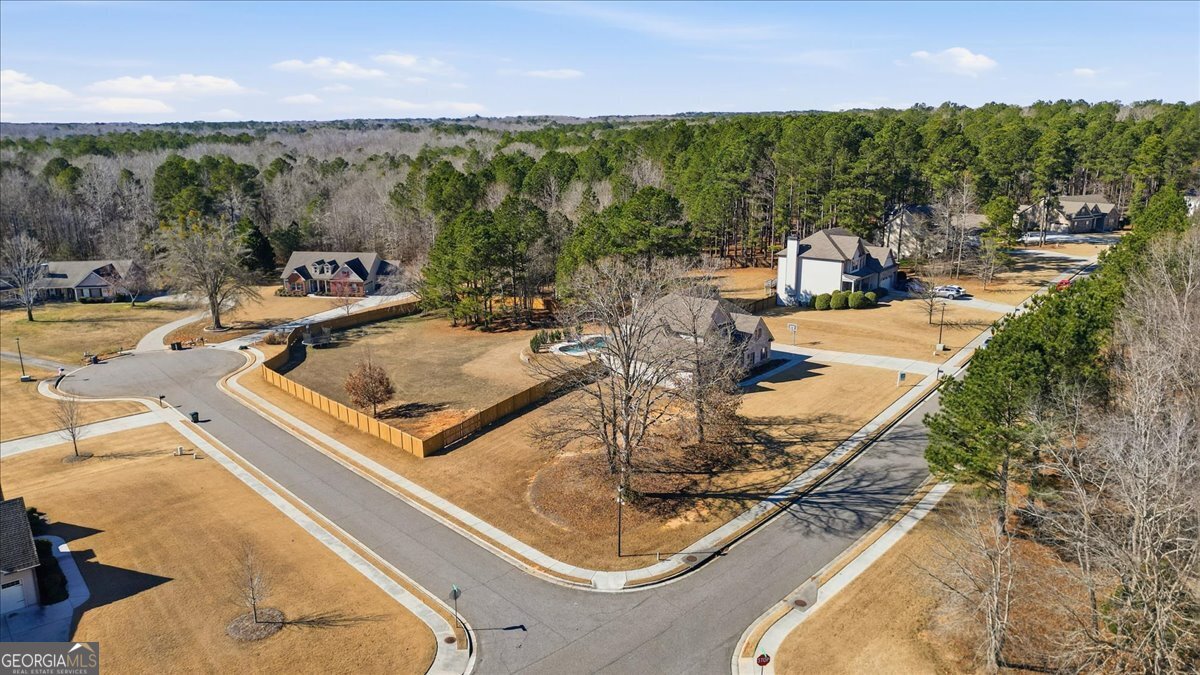 440 Creekside Park Covington, GA 30014 - Photo 51 of 57 a view of a swimming pool with lawn chairs