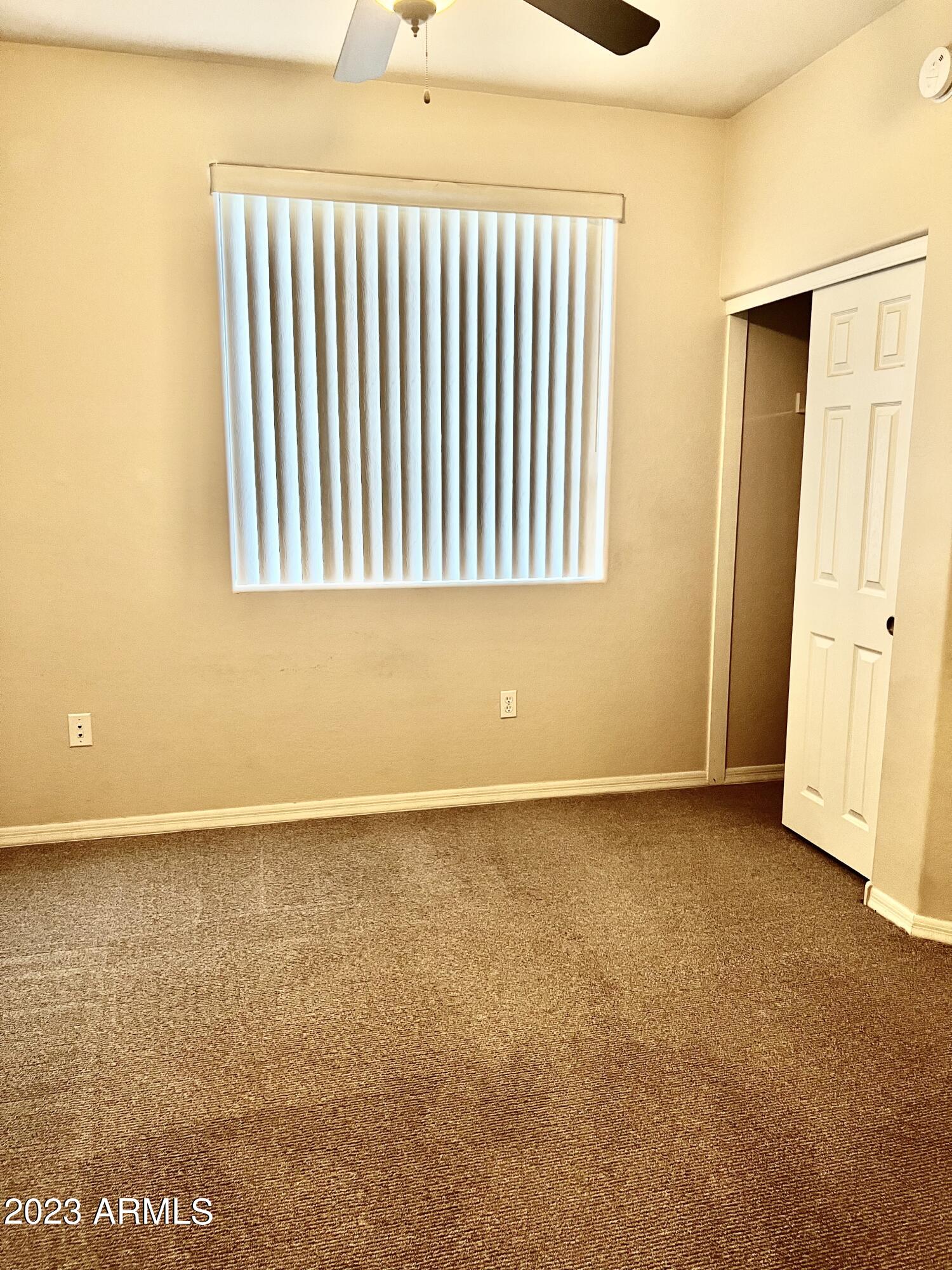 3330 South Gilbert Road, Unit 1007 Chandler, AZ 85286 - Photo 11 of 12 an empty room with a natural light