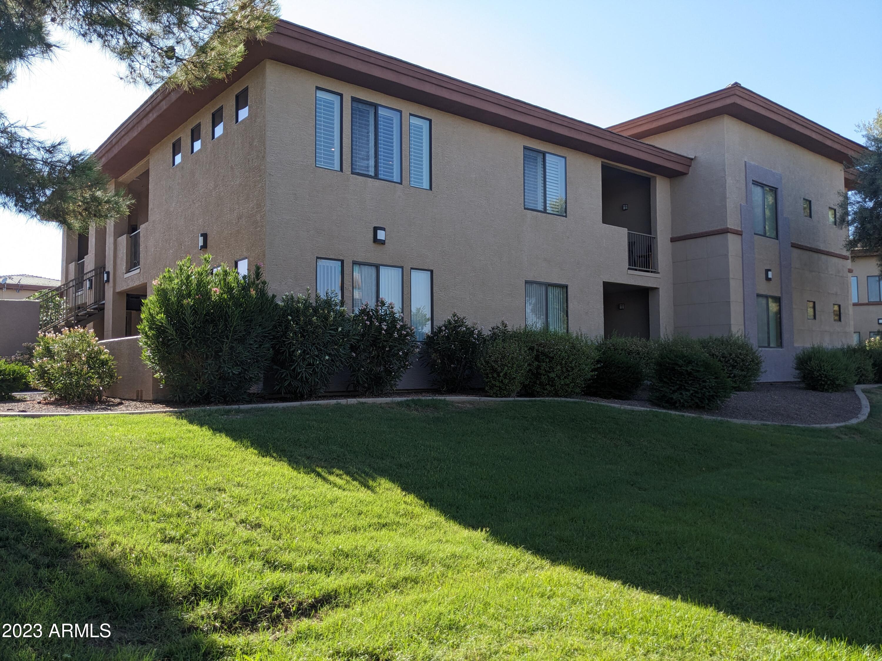 3330 South Gilbert Road, Unit 1007 Chandler, AZ 85286 - Photo 2 of 12 a house view with garden space