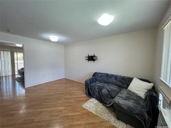 a living room with furniture and couch