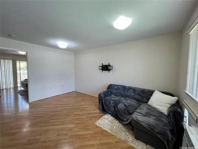 a living room with furniture and couch