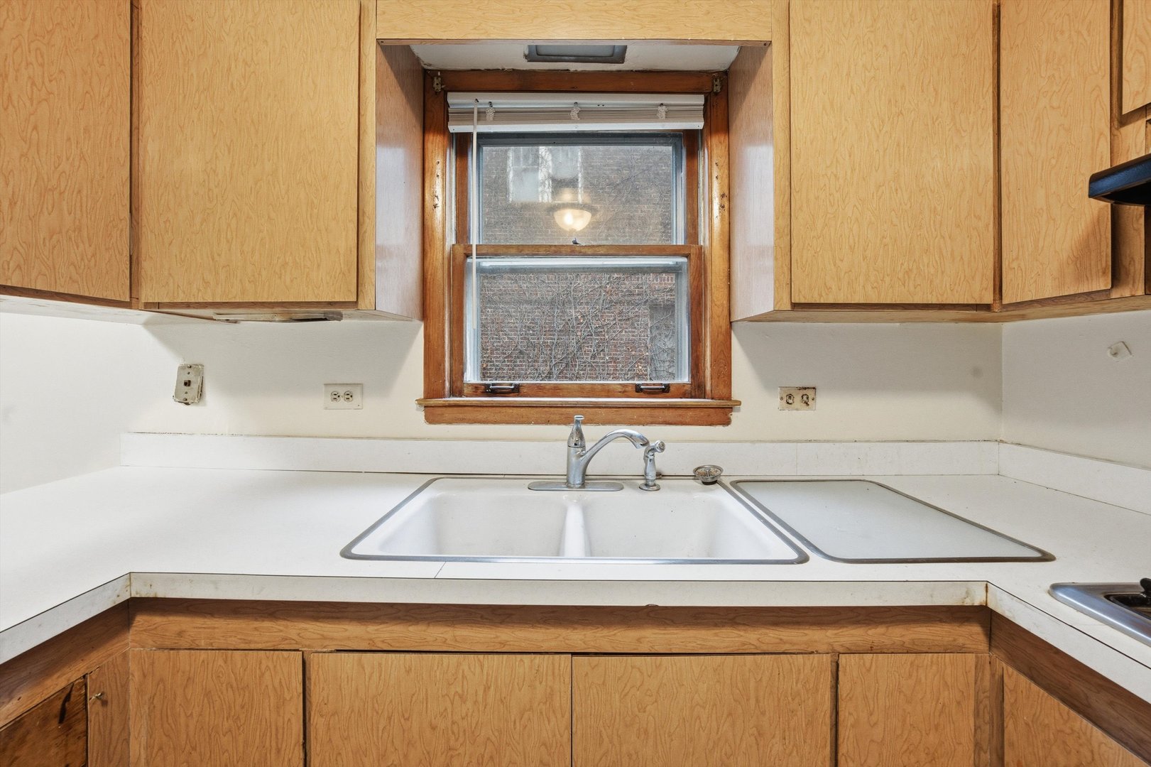 272 East 148th Street Harvey, IL 60426 - Photo 17 of 25 a bathroom with a sink and a mirror