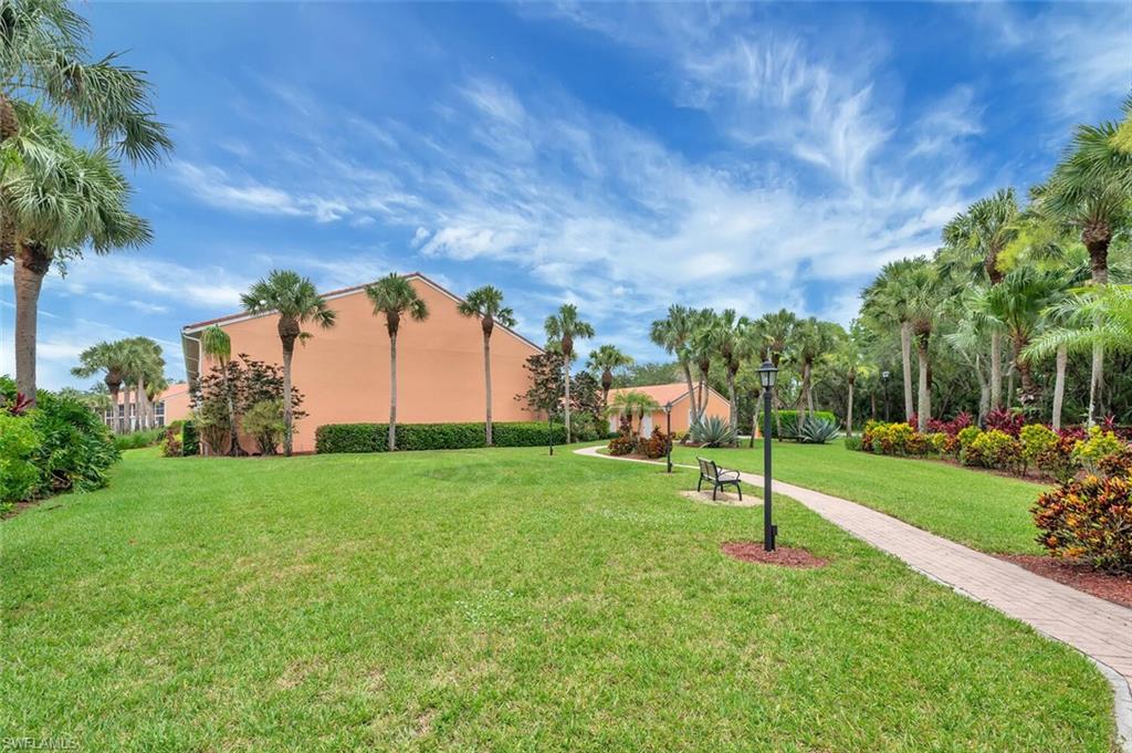 6720 Beach Resort Drive, Unit 10 Naples, FL 34114 - Photo 20 of 34 View of green lawn
