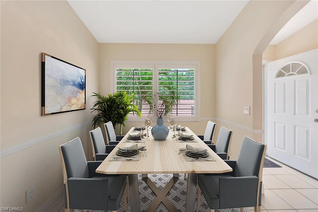 6720 Beach Resort Drive, Unit 10 Naples, FL 34114 - Photo 5 of 34 Eat in Kitchen with arched walkways and light tile patterned floors. This photo is virtually staged.