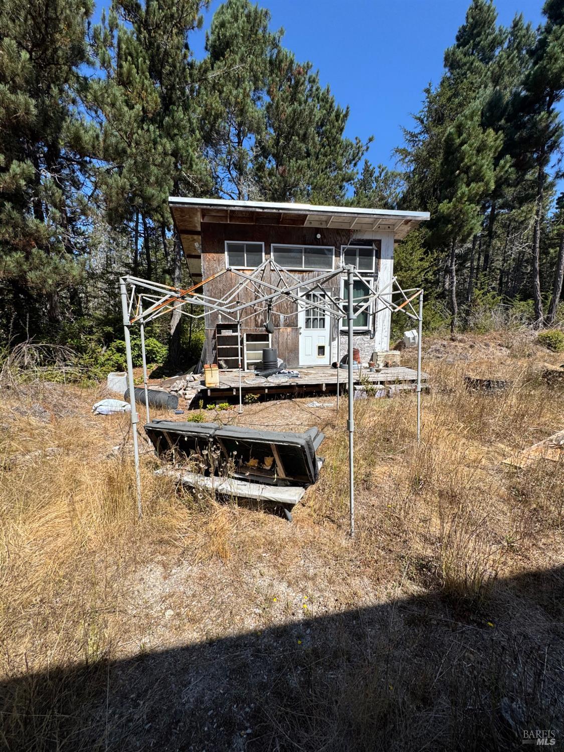 28270 Albion Ridge Road Albion, CA 95410 - Photo 17 of 22 a backyard of a house with barbeque oven