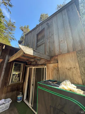 a view of outdoor space and wooden deck