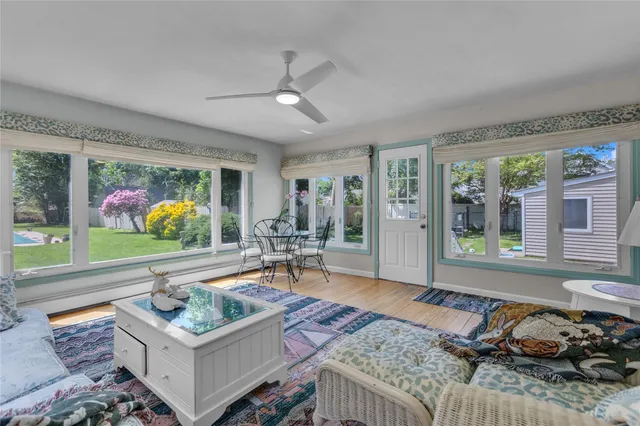 a living room with furniture and window
