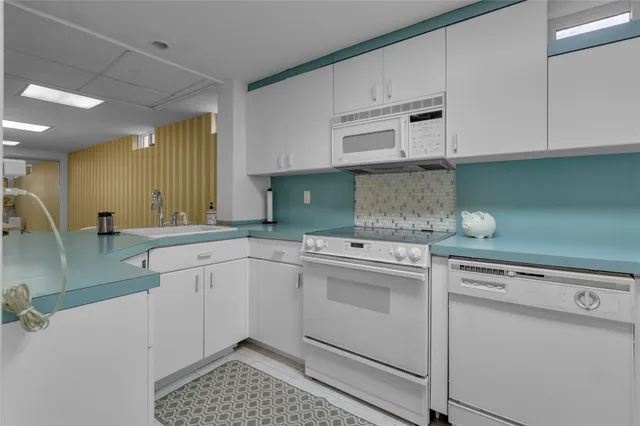 a bedroom with a bed and a mirror