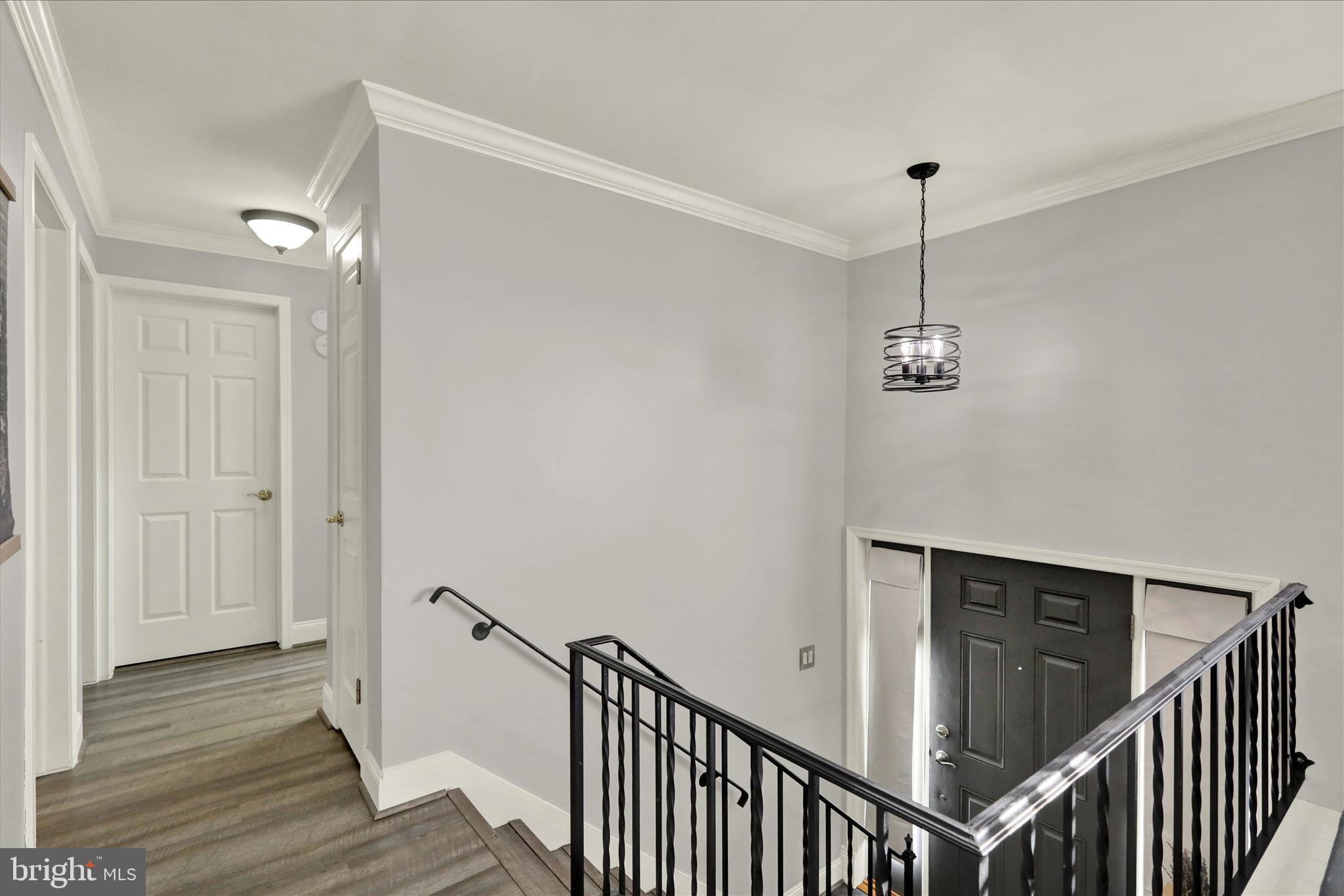 933 Philadelphia Avenue Reading, PA 19607 - Photo 15 of 34 a view of a hallway with a hardwood floor