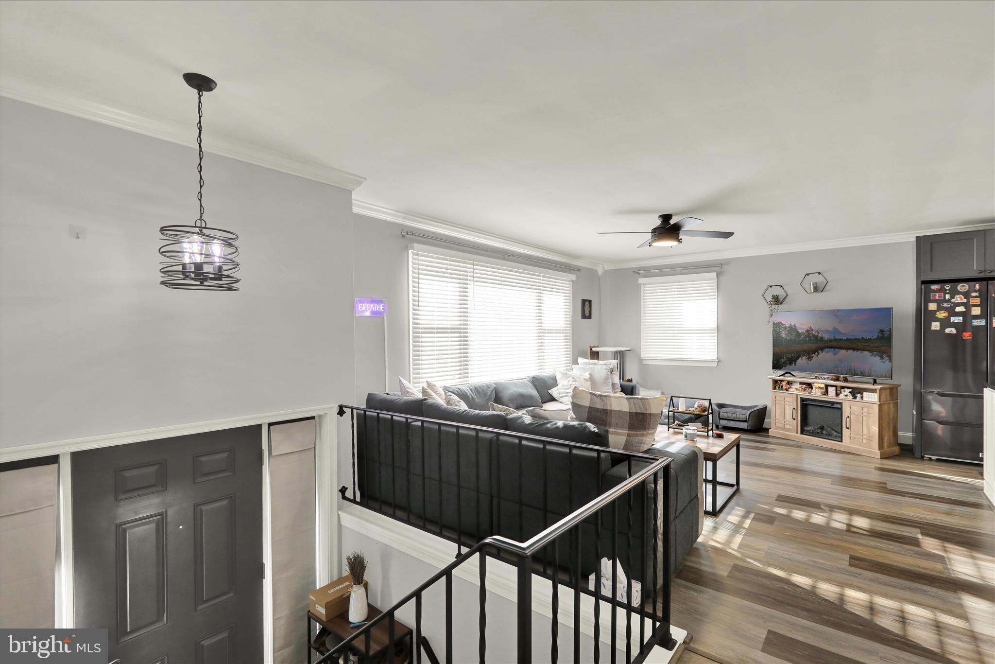 933 Philadelphia Avenue Reading, PA 19607 - Photo 16 of 34 a kitchen with stainless steel appliances kitchen island granite countertop a sink a stove and a wooden floors