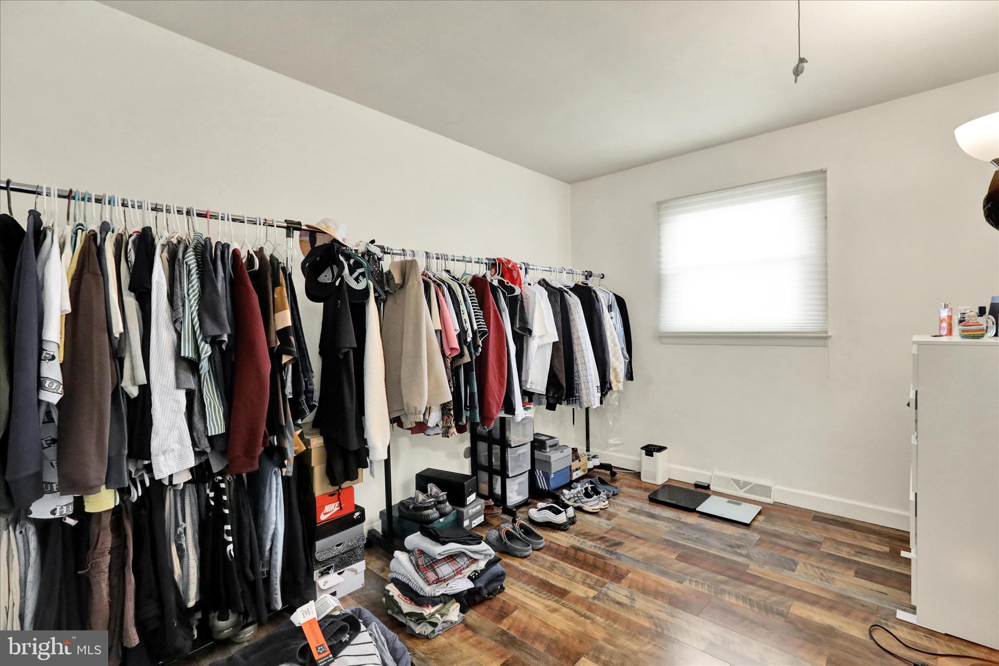 933 Philadelphia Avenue Reading, PA 19607 - Photo 17 of 34 a view of walk in closet with clothes and shoes