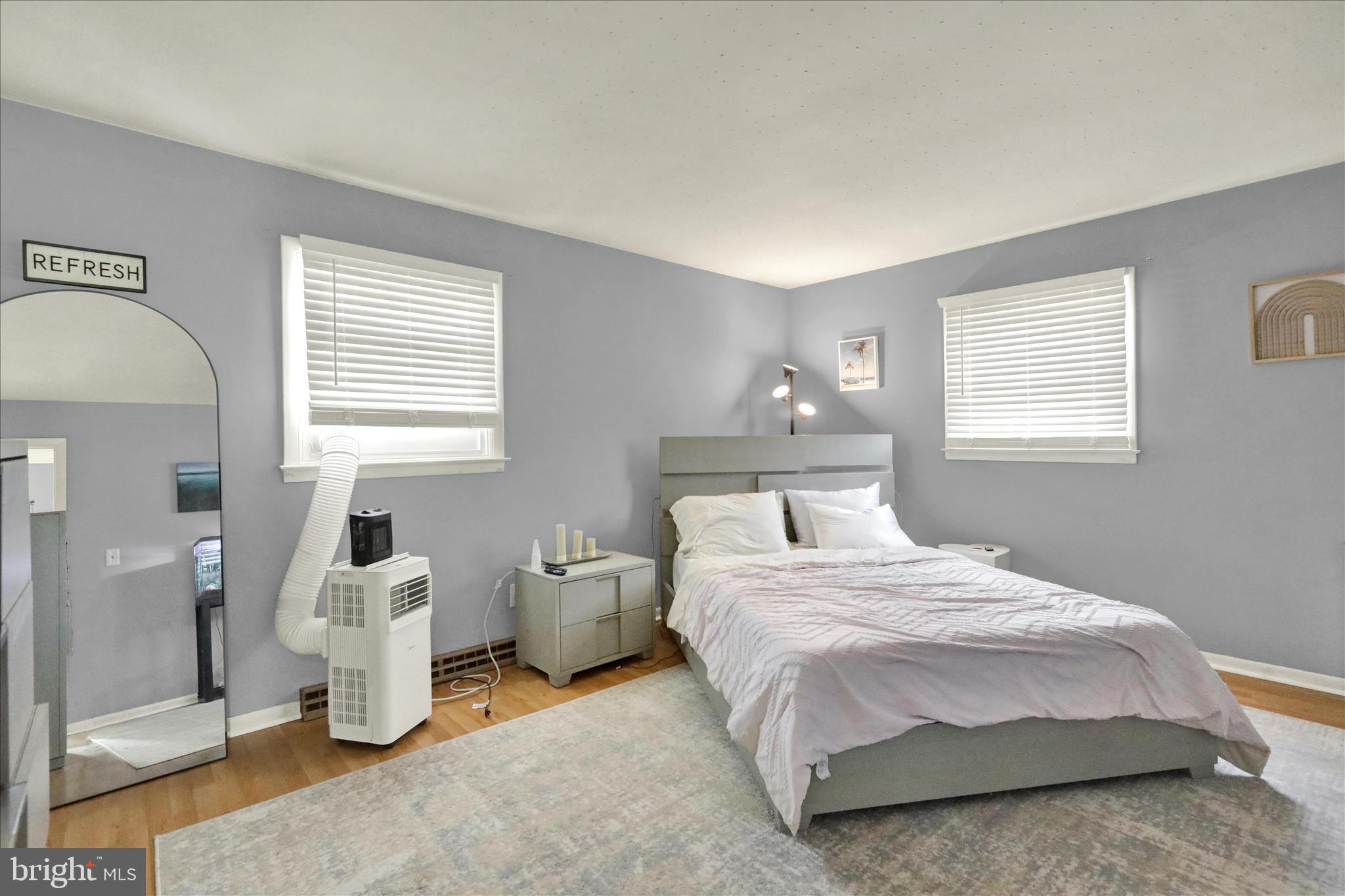 933 Philadelphia Avenue Reading, PA 19607 - Photo 18 of 34 a bedroom with a bed and a window