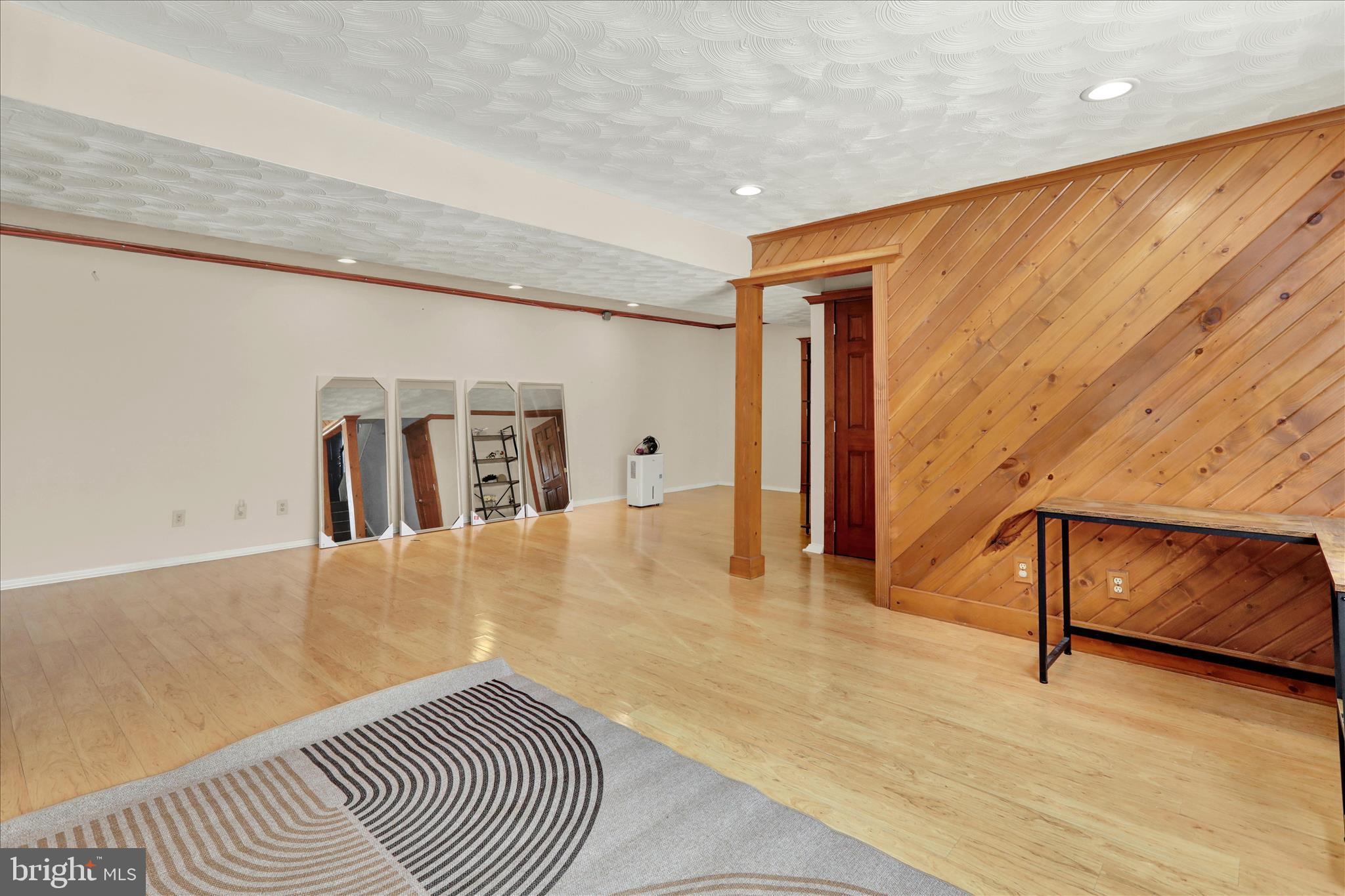 933 Philadelphia Avenue Reading, PA 19607 - Photo 25 of 34 a view of a hallway with wooden floor