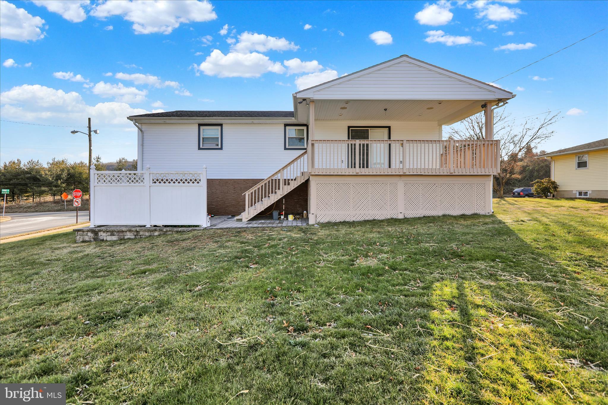 933 Philadelphia Avenue Reading, PA 19607 - Photo 30 of 34 a front view of a house with a yard