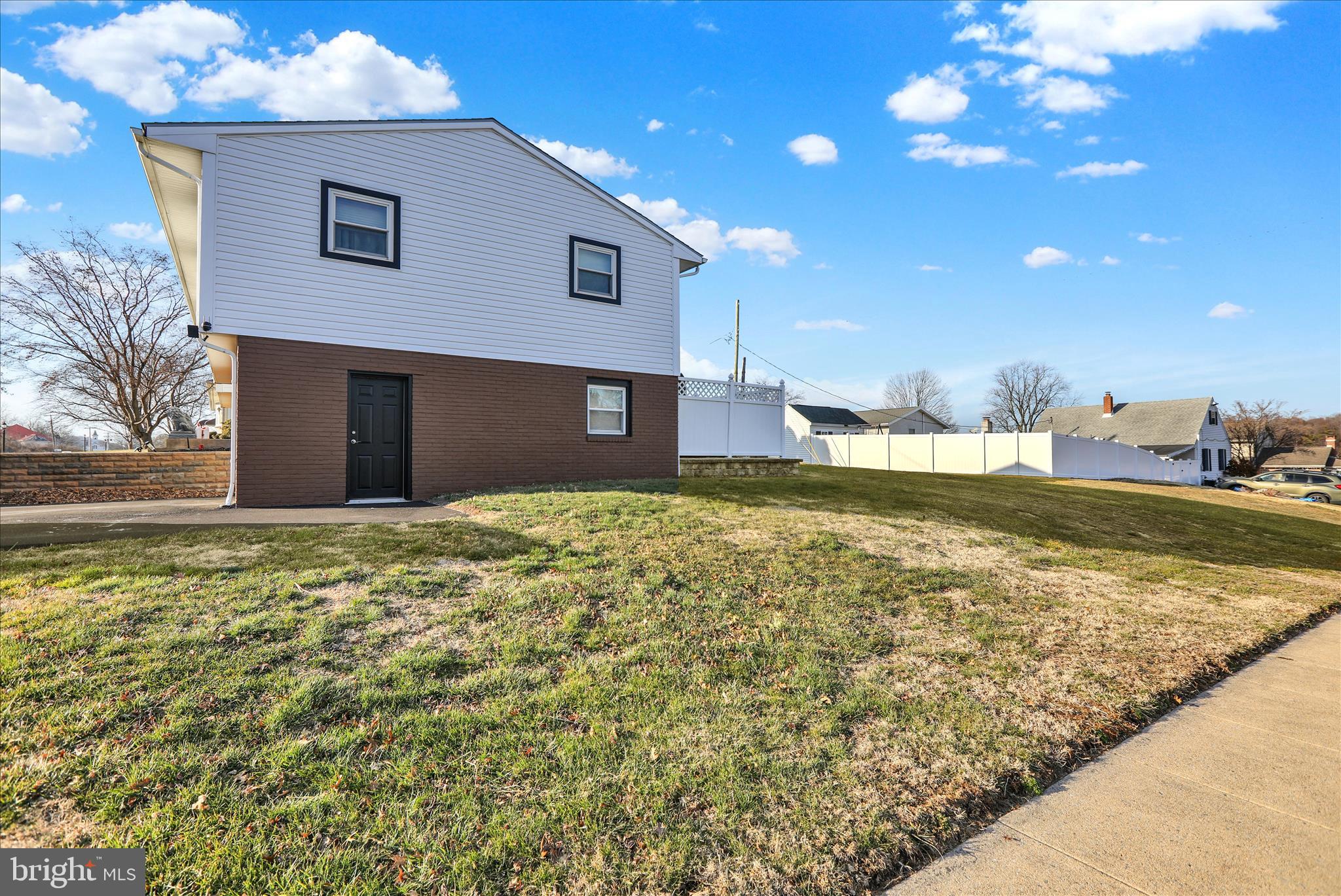 933 Philadelphia Avenue Reading, PA 19607 - Photo 34 of 34 a view of a house with a yard