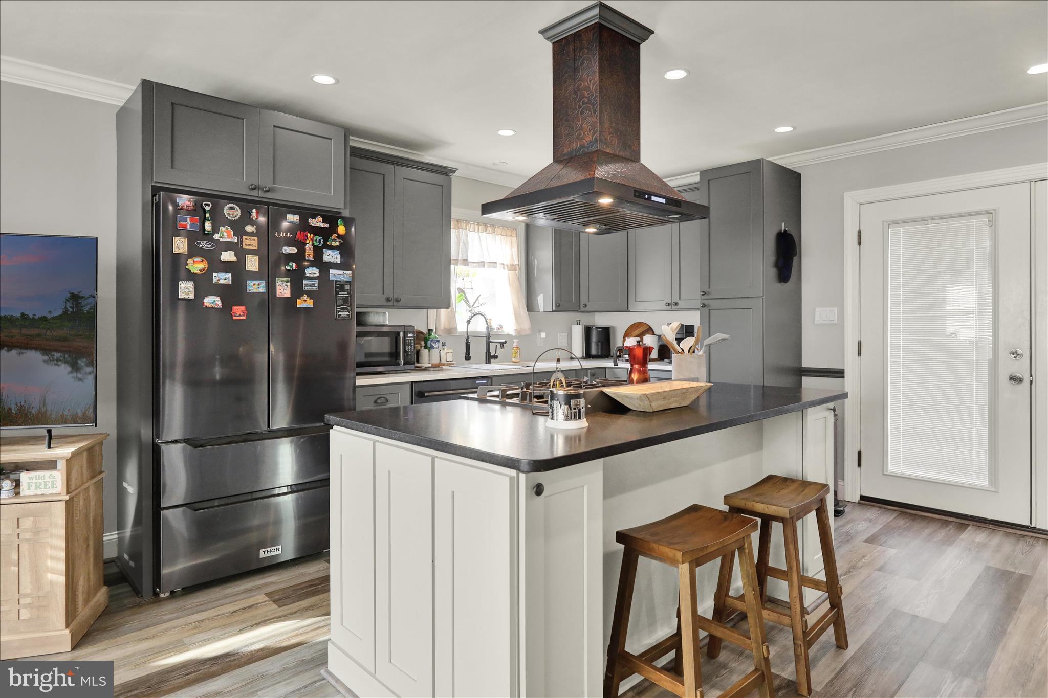 933 Philadelphia Avenue Reading, PA 19607 - Photo 9 of 34 a kitchen with stainless steel appliances a sink and a refrigerator