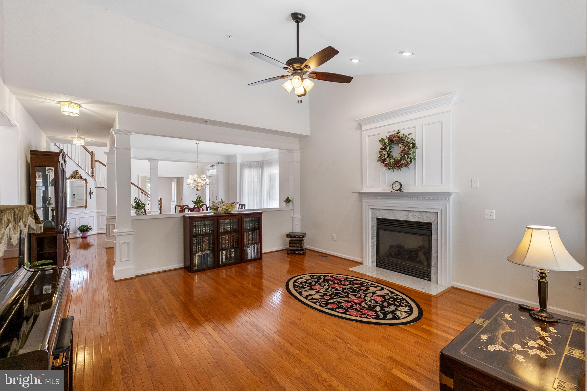 8245 Academy Road, Unit 42 Ellicott City, MD 21043 - Photo 12 of 48 main level living room with vaulted ceilings
