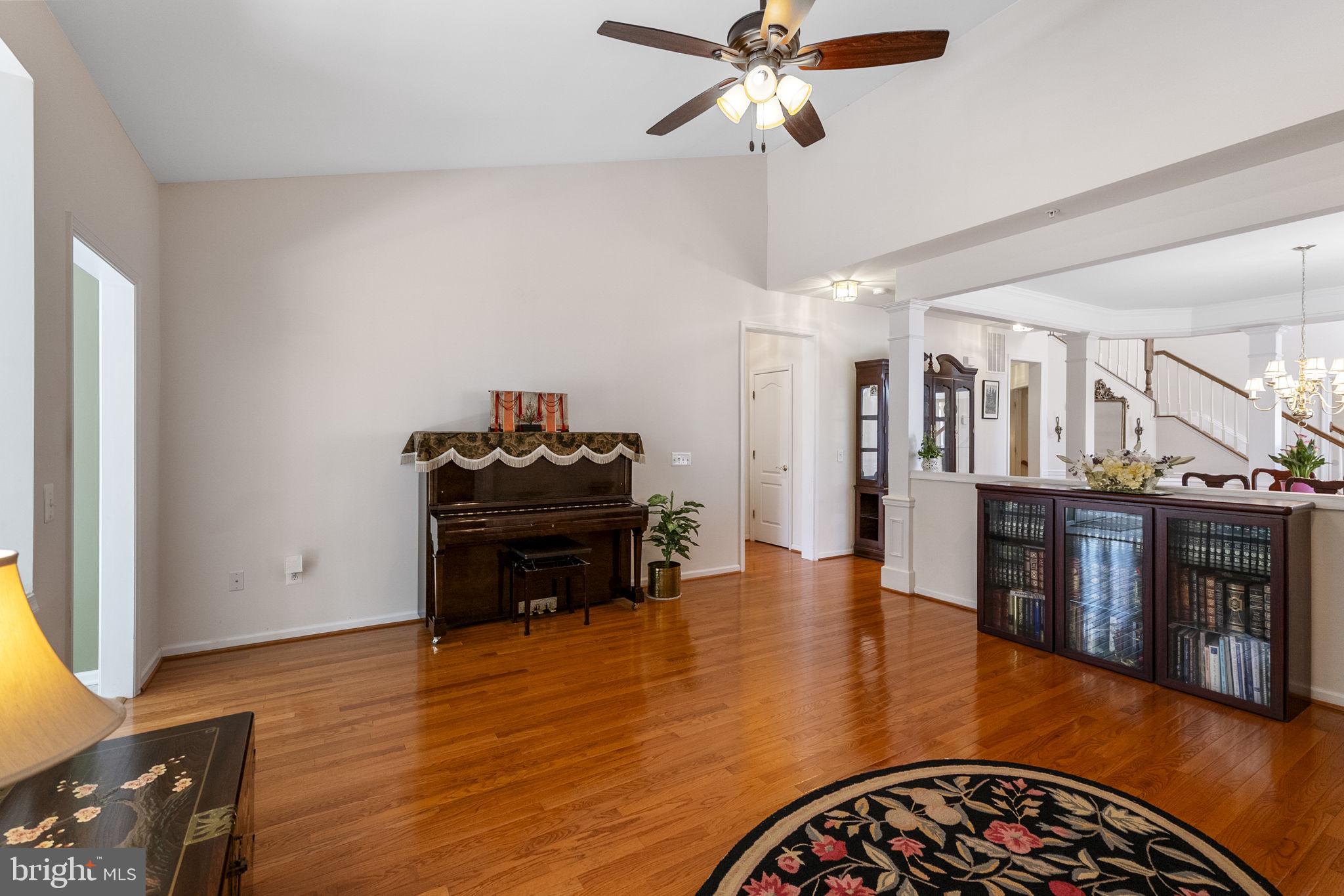 8245 Academy Road, Unit 42 Ellicott City, MD 21043 - Photo 13 of 48 main level living room with vaulted ceilings