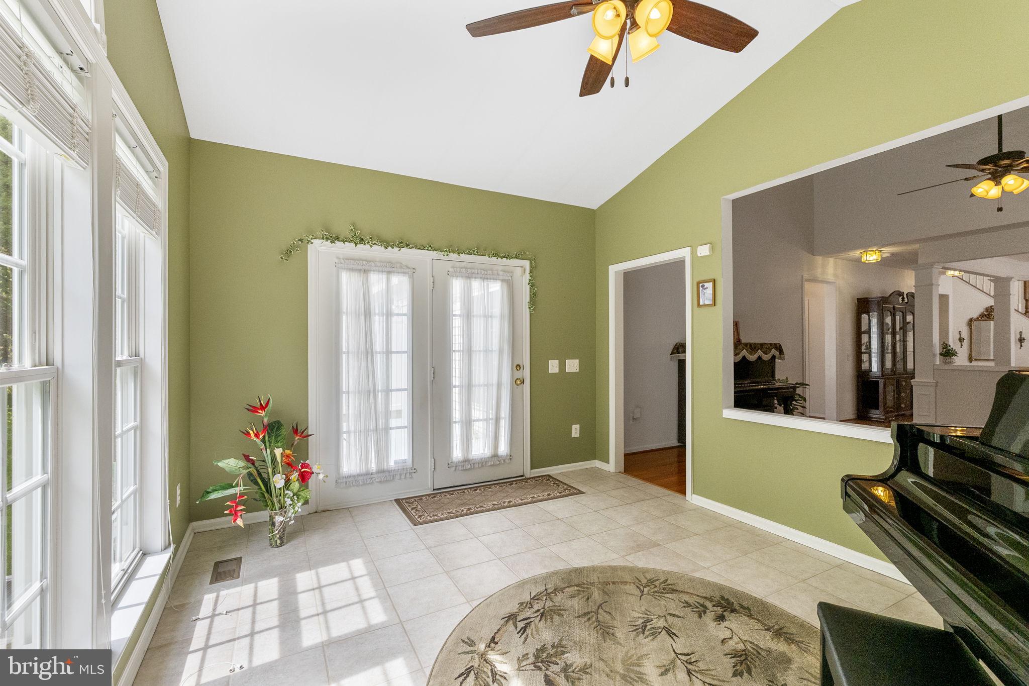 8245 Academy Road, Unit 42 Ellicott City, MD 21043 - Photo 15 of 48 Main level room with door to back deck
