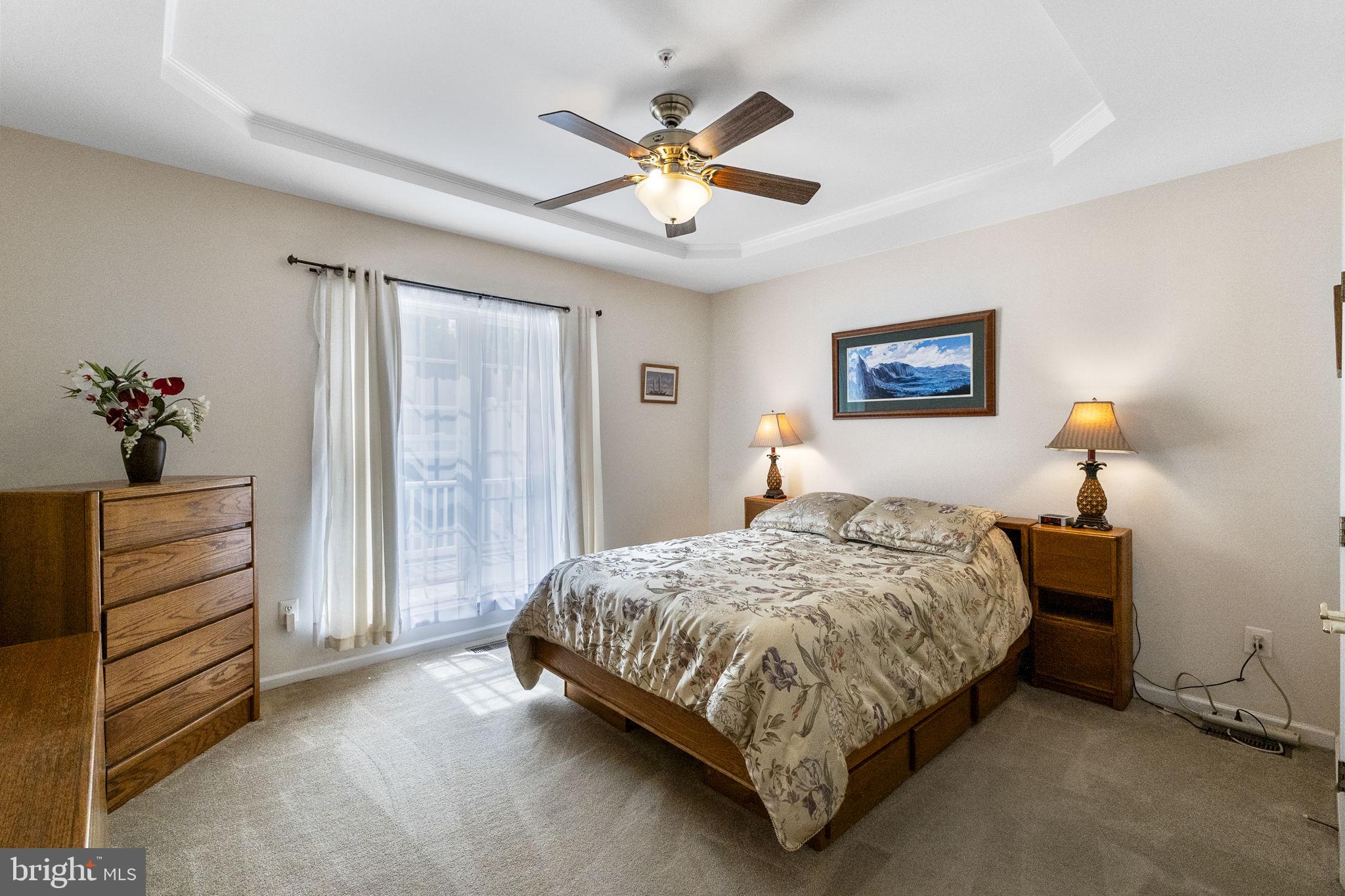 8245 Academy Road, Unit 42 Ellicott City, MD 21043 - Photo 17 of 48 Main level Primary Bedroom with ensuite