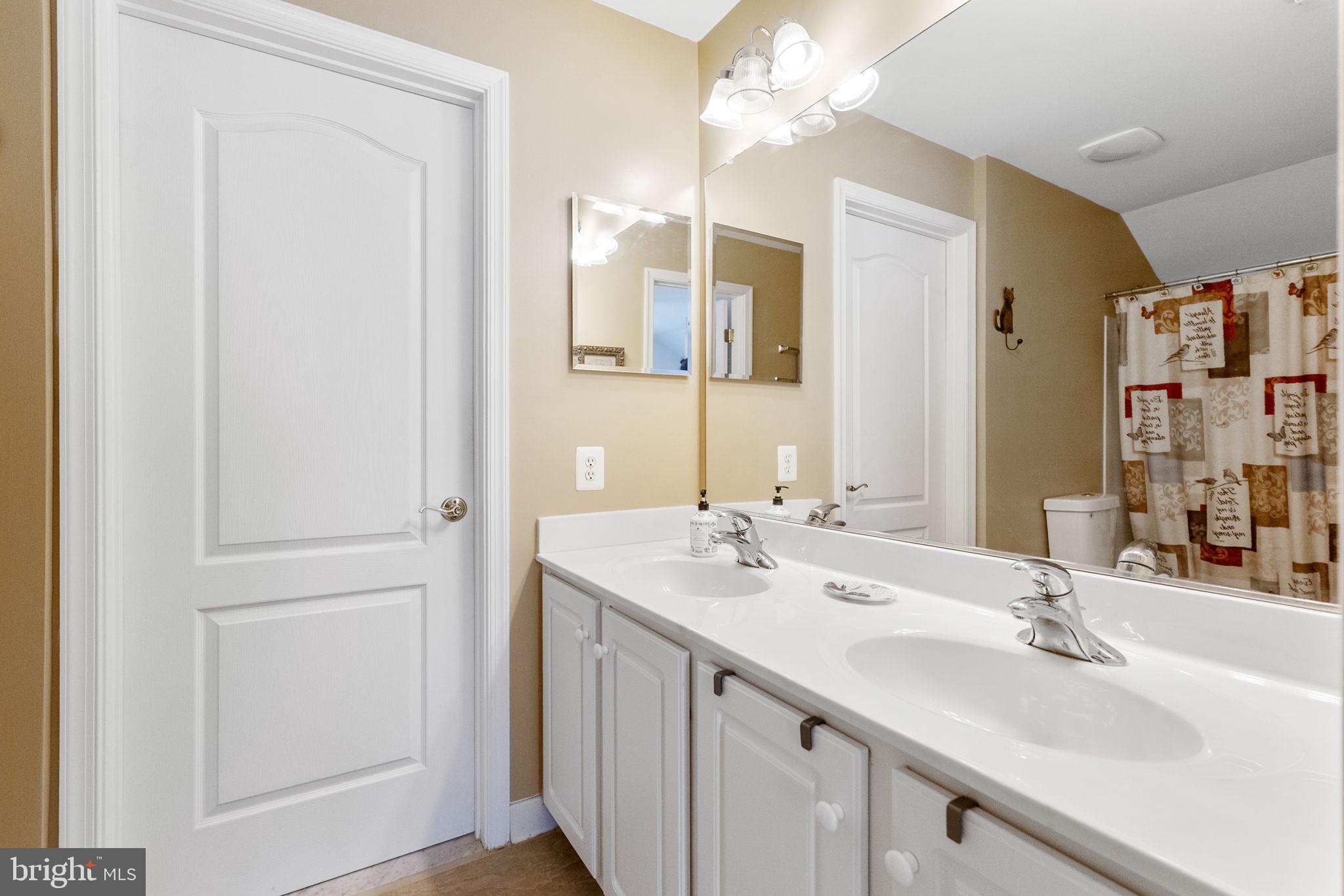 8245 Academy Road, Unit 42 Ellicott City, MD 21043 - Photo 29 of 48 A Jack and Jill bathroom on upper level