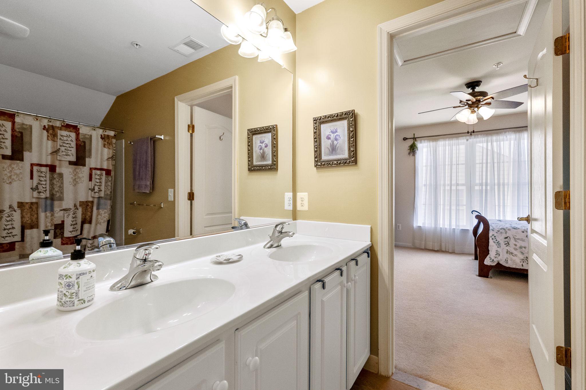 8245 Academy Road, Unit 42 Ellicott City, MD 21043 - Photo 30 of 48 A Jack and Jill bathroom on upper level