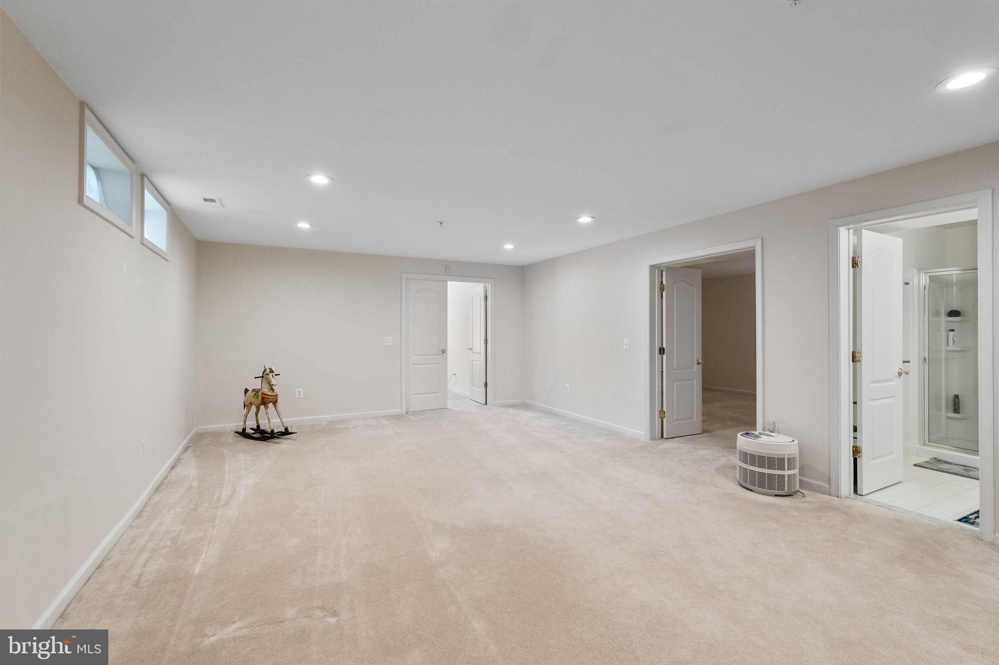 8245 Academy Road, Unit 42 Ellicott City, MD 21043 - Photo 33 of 48 Large open space in basement