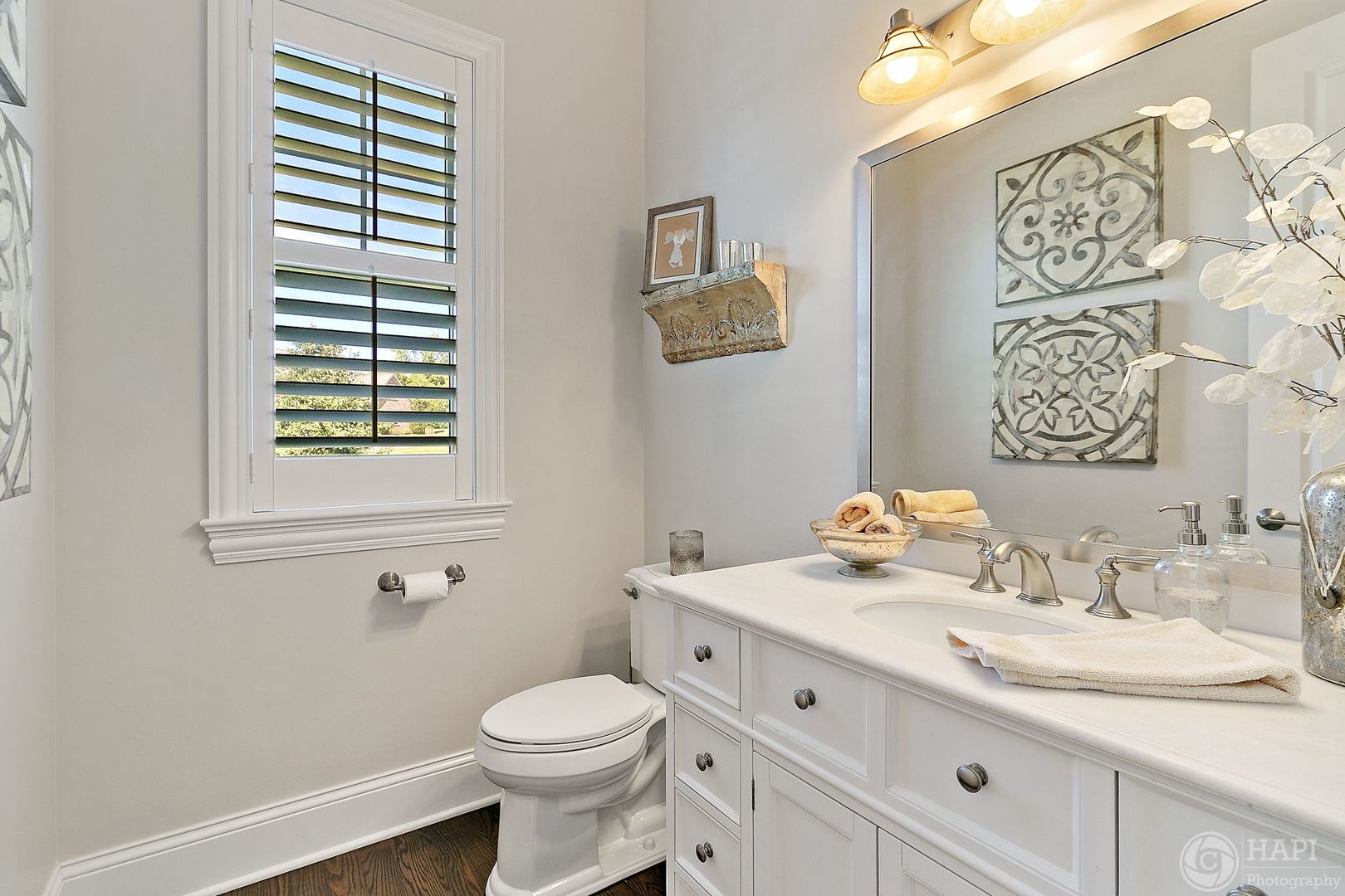 26021 West Sunset Road Barrington, IL 60010 - Photo 12 of 39 a bathroom with a granite countertop toilet sink and mirror