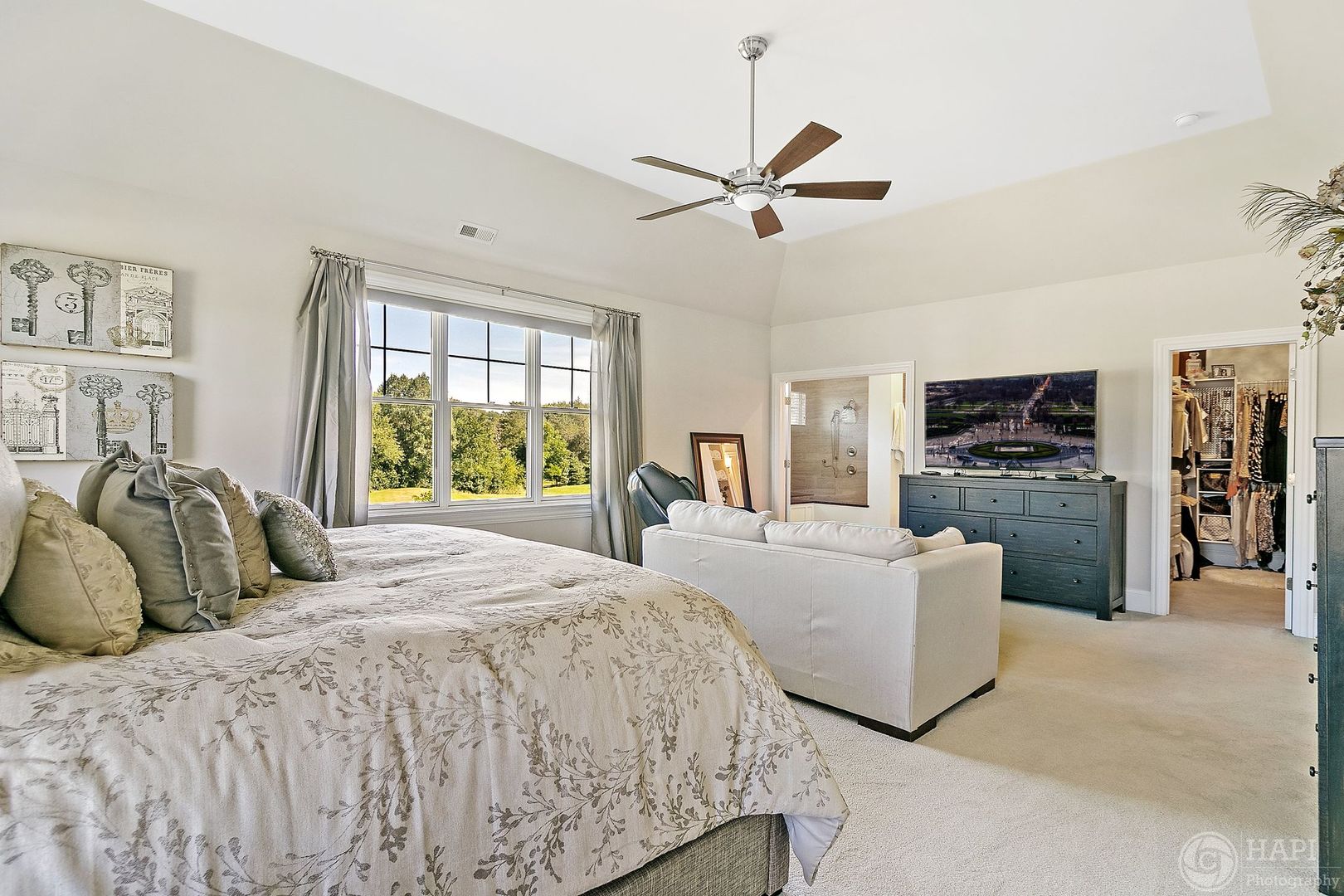 26021 West Sunset Road Barrington, IL 60010 - Photo 16 of 39 a bedroom with a large bed and a window