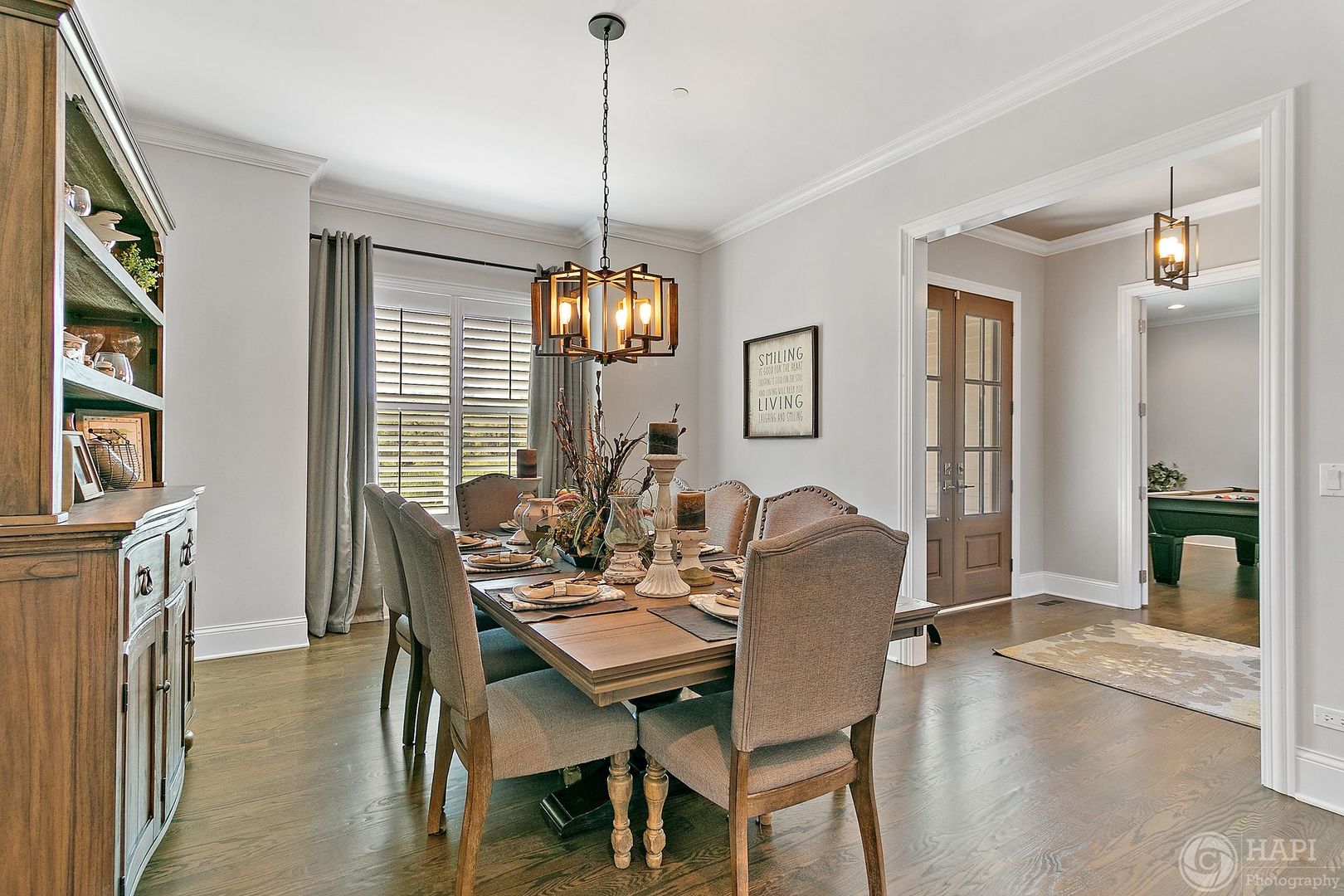 26021 West Sunset Road Barrington, IL 60010 - Photo 3 of 39 a view of a dining room with furniture and wooden floor