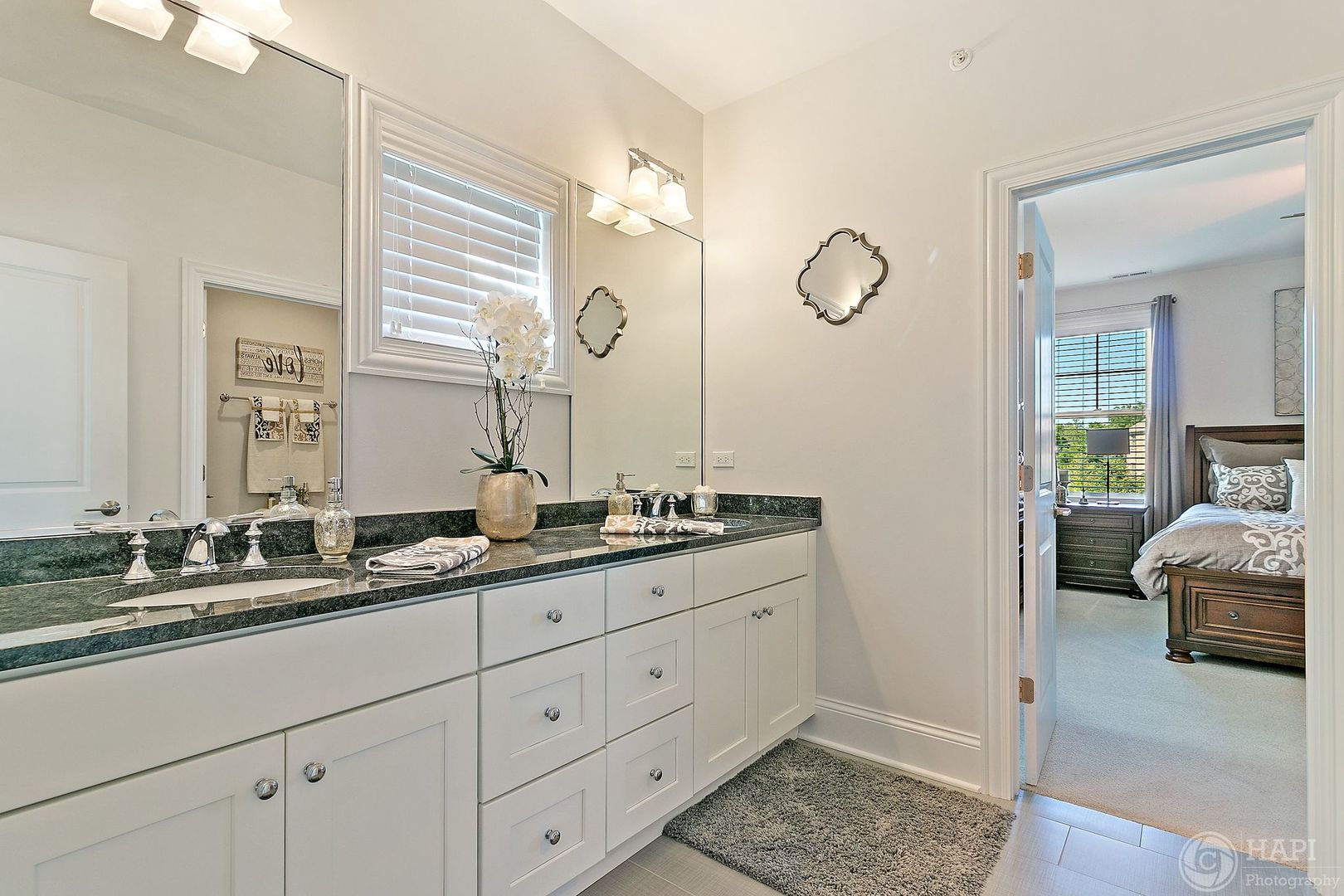 26021 West Sunset Road Barrington, IL 60010 - Photo 21 of 39 a en suite bathroom with double sink and a mirror
