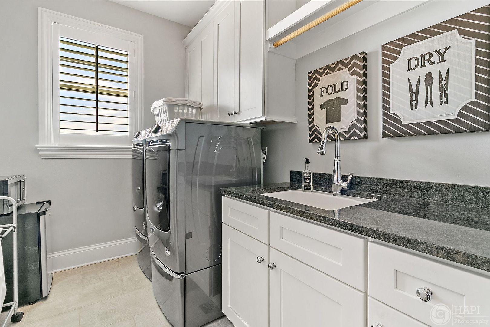 26021 West Sunset Road Barrington, IL 60010 - Photo 29 of 39 a bathroom with a granite countertop sink and a mirror