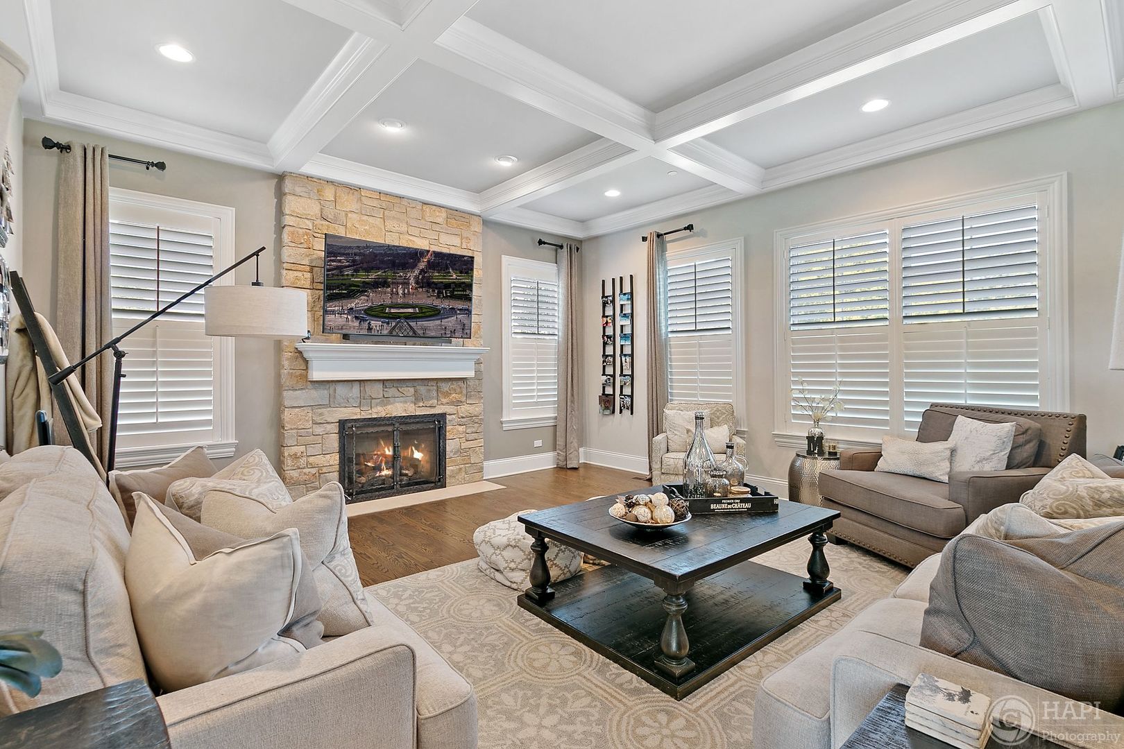 26021 West Sunset Road Barrington, IL 60010 - Photo 4 of 39 a living room with furniture fireplace and flat screen tv