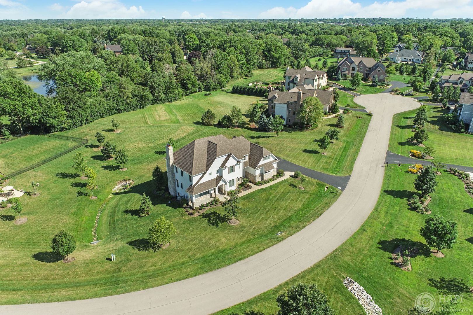 26021 West Sunset Road Barrington, IL 60010 - Photo 36 of 39 a view of a garden with a fountain
