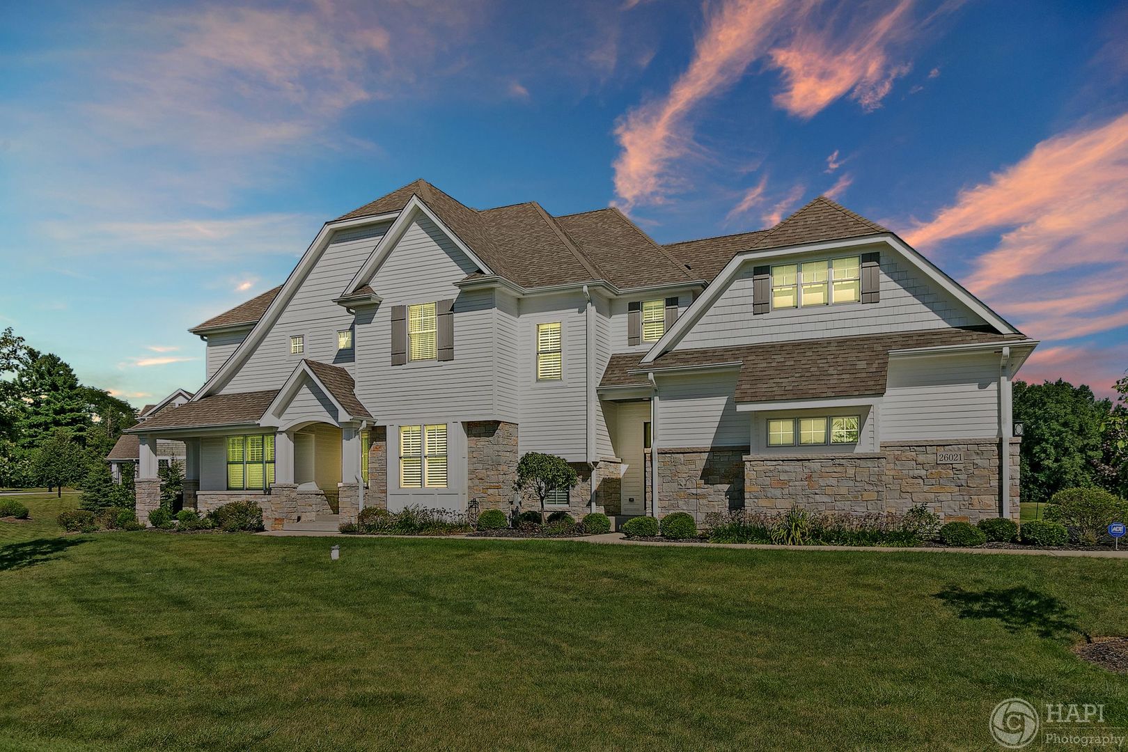 26021 West Sunset Road Barrington, IL 60010 - Photo 39 of 39 a front view of a house with a garden