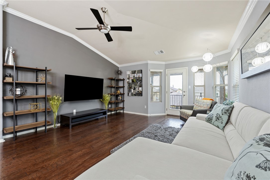 7310 Sunset Heights Circle, Unit F20 Austin, TX 78735 - Photo 14 of 32 a living room with furniture and a flat screen tv