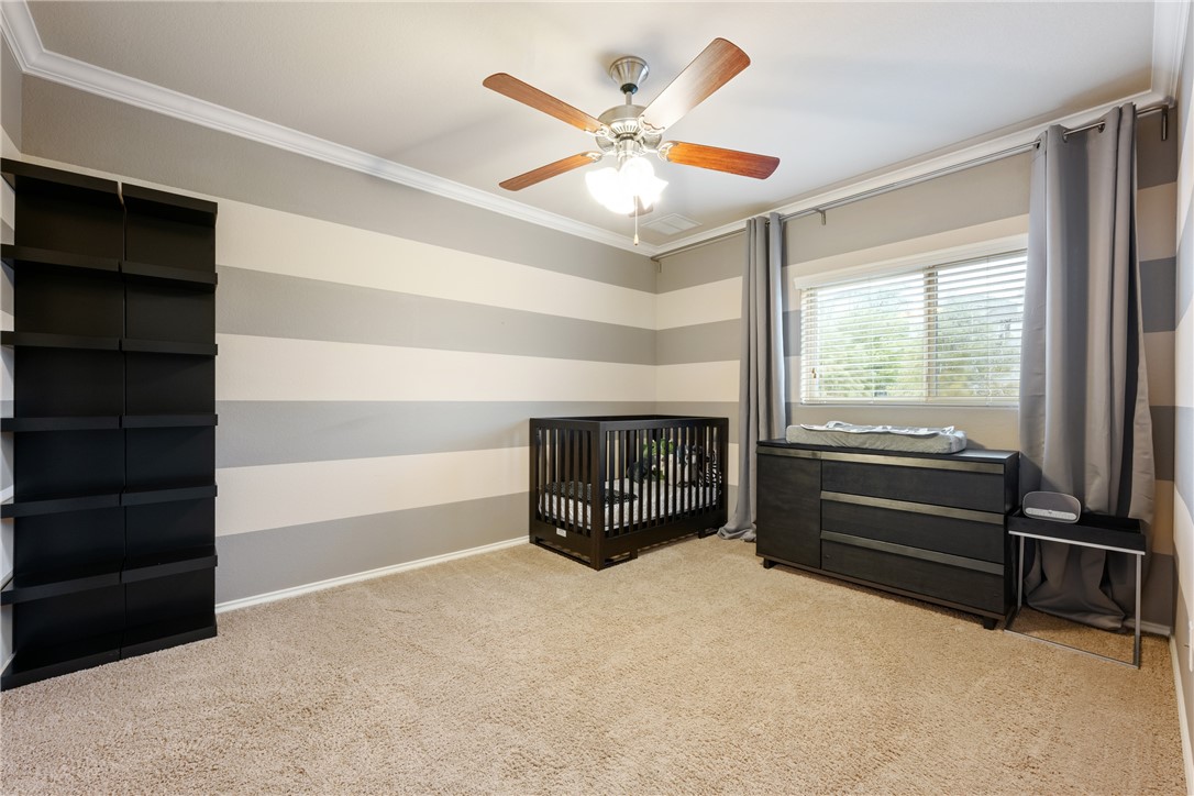 7310 Sunset Heights Circle, Unit F20 Austin, TX 78735 - Photo 22 of 32 a room with closet and a ceiling fan