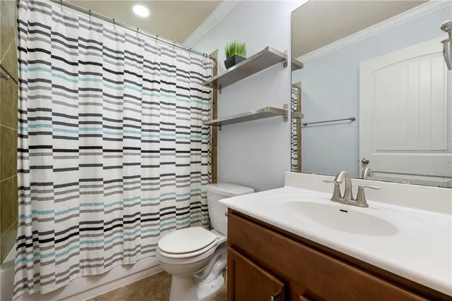 a bathroom with a sink and a toilet