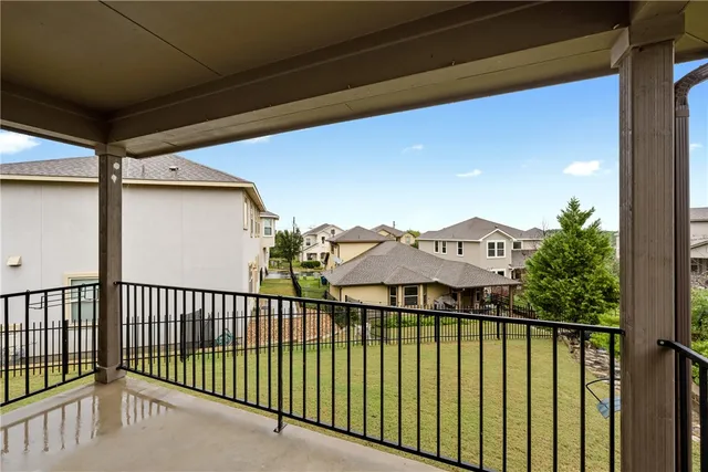 a view of a balcony with a couple of small garden