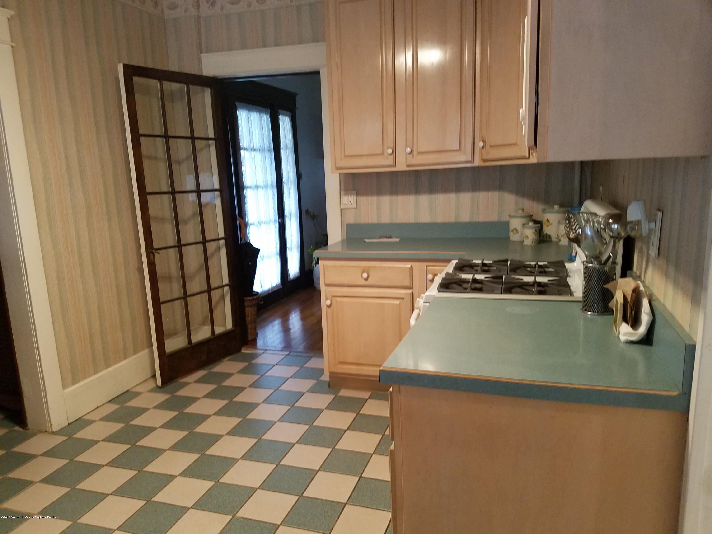 79 Rector Place Red Bank, NJ 07701 - Photo 12 of 42 kitchen french dr to LR