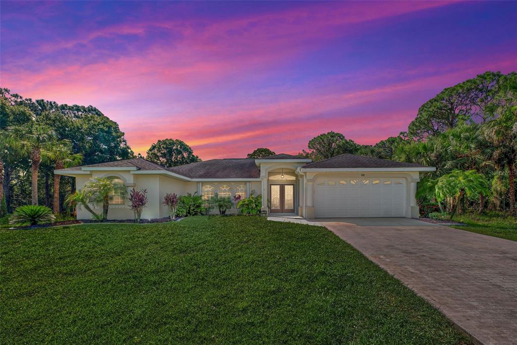 108 Marker Road Rotonda West, FL 33947 - Photo 1 of 1 Twilight shot