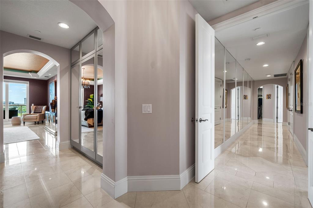 464 Golden Gate Point, Unit 703 Sarasota, FL 34236 - Photo 43 of 88 a view of a hallway with dining area
