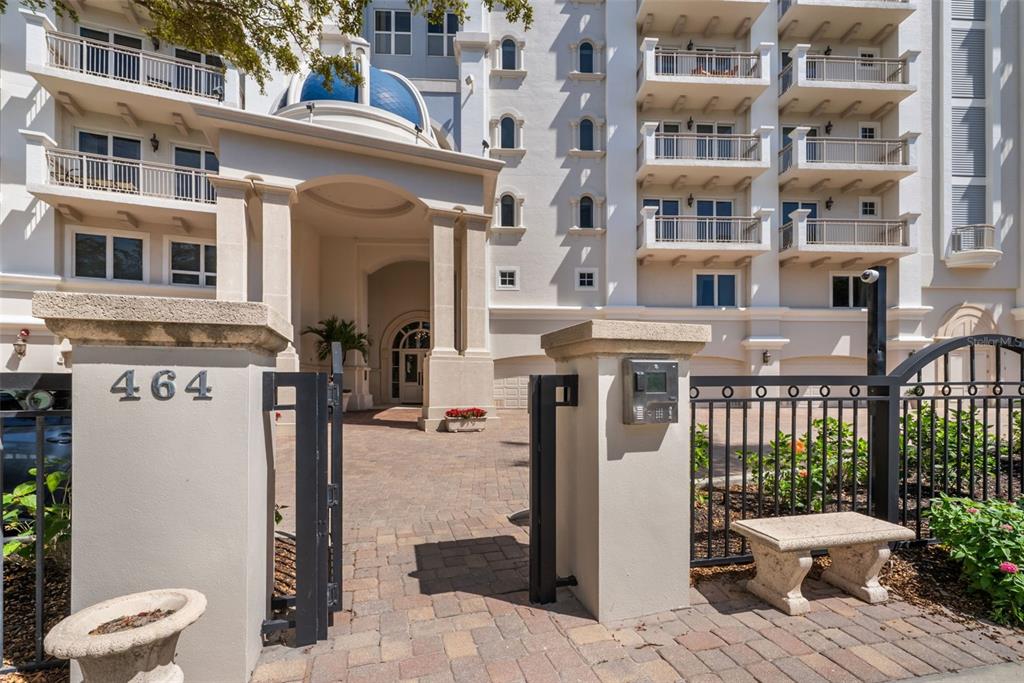 464 Golden Gate Point, Unit 703 Sarasota, FL 34236 - Photo 5 of 88 a view of a building with many windows