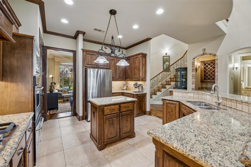 1608 Tuscan Ridge Circle Southlake, TX 76092 - Photo 11 of 36 a kitchen with a counter top space appliances and a counter space
