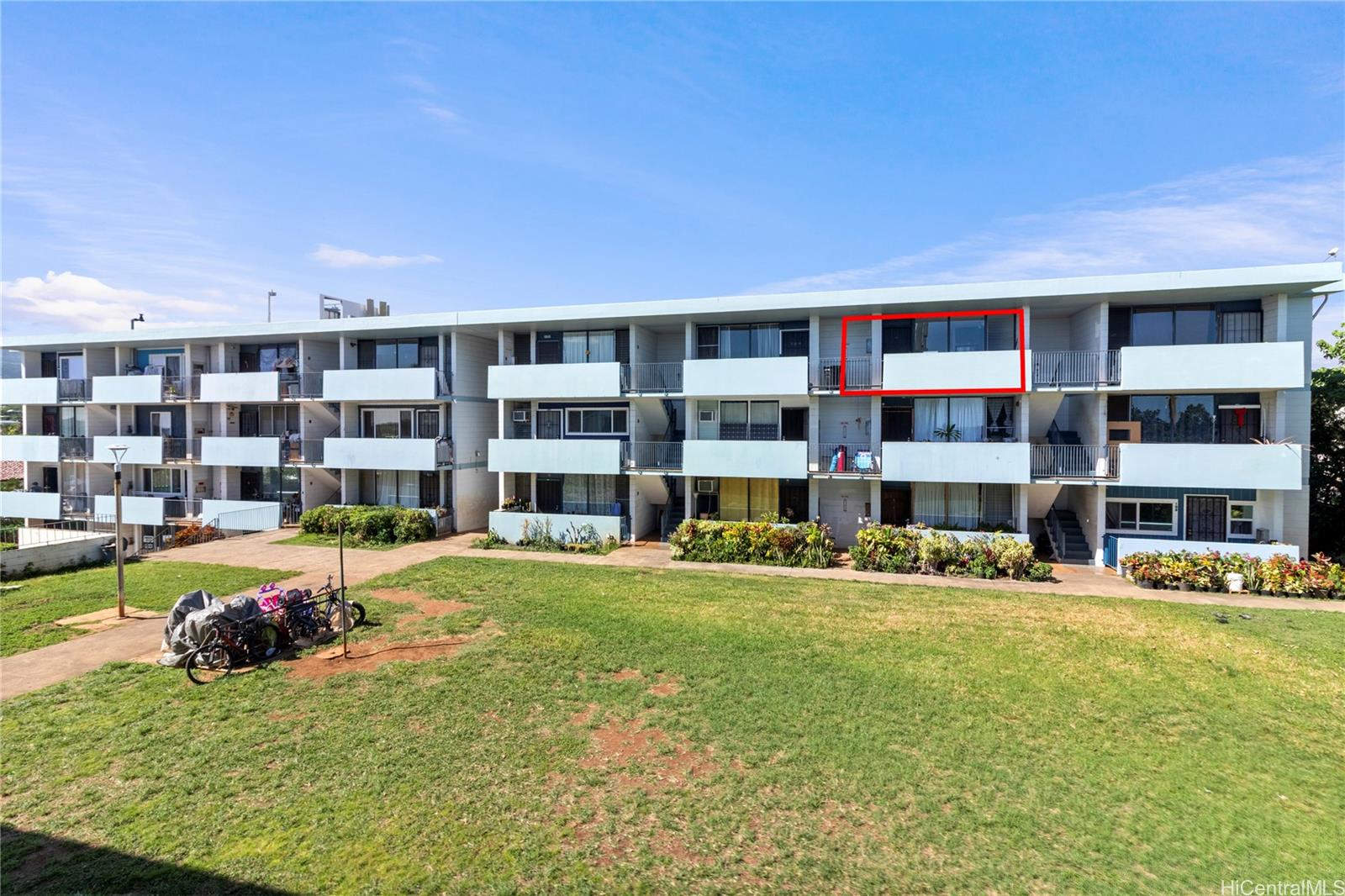 94-249 Waikele Road, Unit A307 Waipahu, HI 96797 - Photo 13 of 20 a view of building with yard